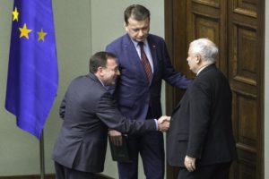 Mariusz Kamiński i Mariusz Błaszczak z Jarosławem Kamińskim